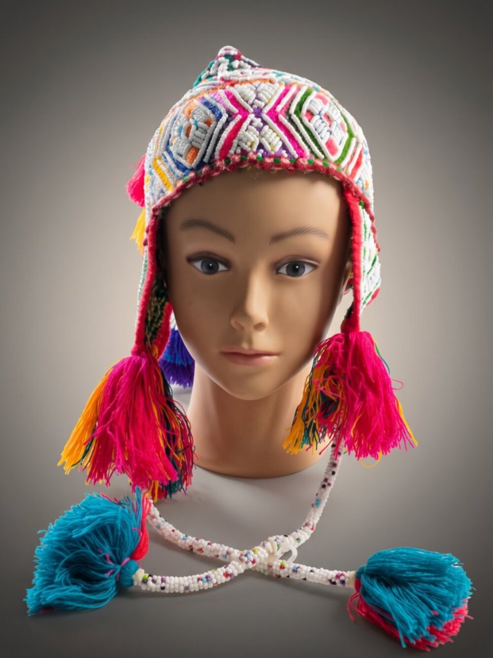 Handcrafted Andean Chullo with Beadwork and Multicolored Pom-poms